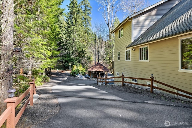 81 N Fawn Dr, Hoodsport, WA 98548 - view of side of property with a gazebo and a shingled roof