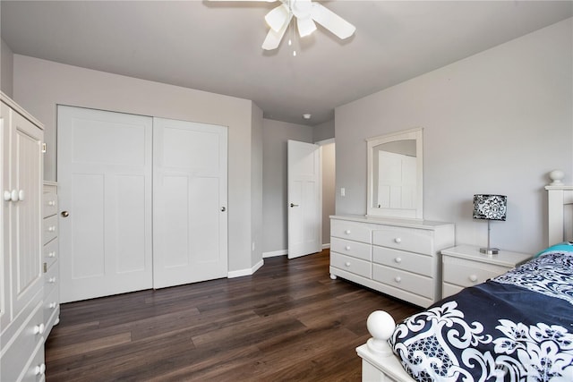 11234 SE 299th Pl, Auburn, WA 98092 - bedroom featuring a ceiling fan, dark wood-style flooring, baseboards, and a closet