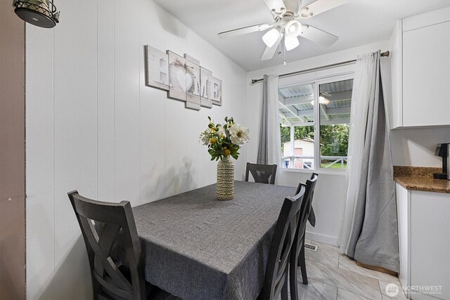 30573 5th Ave SW, Federal Way, WA 98023 - dining space featuring a ceiling fan, marble finish floor, and visible vents