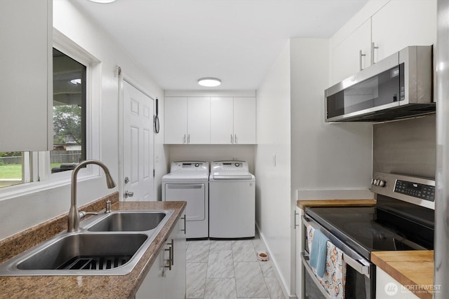 30573 5th Ave SW, Federal Way, WA 98023 - washroom with separate washer and dryer, laundry area, marble finish floor, and a sink