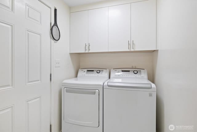 30573 5th Ave SW, Federal Way, WA 98023 - washroom featuring separate washer and dryer and cabinet space