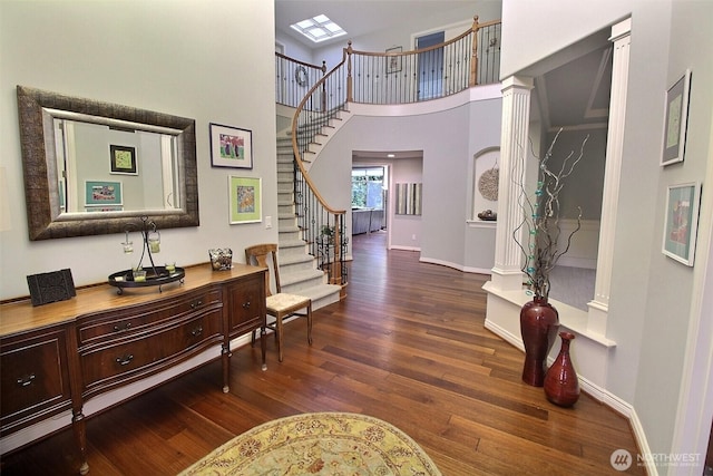 2116 263rd Pl SE, Sammamish, WA 98075 - entrance foyer with stairway, baseboards, dark wood-style flooring, and a towering ceiling