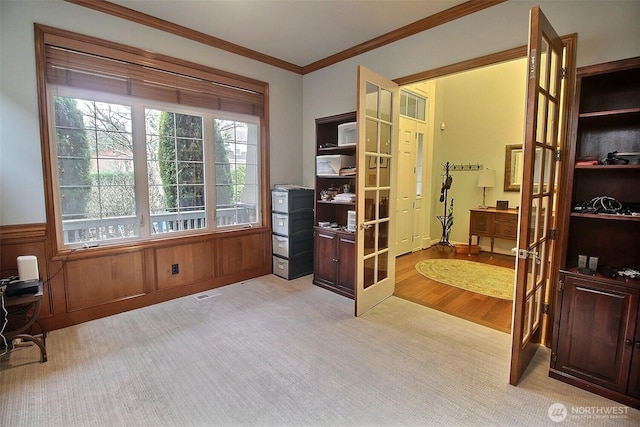 2116 263rd Pl SE, Sammamish, WA 98075 - interior space featuring crown molding, visible vents, french doors, and light colored carpet