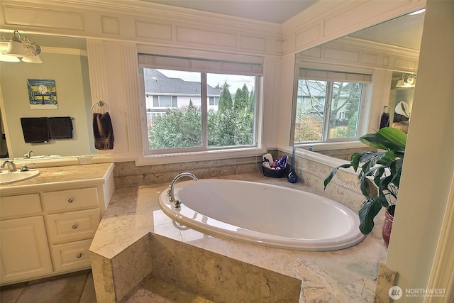 2116 263rd Pl SE, Sammamish, WA 98075 - bathroom featuring crown molding, a garden tub, and vanity