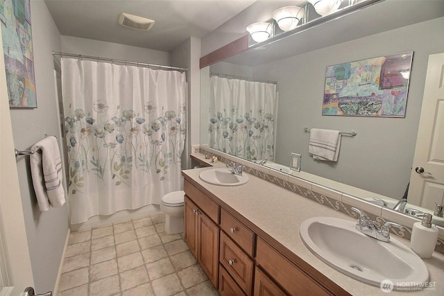 2116 263rd Pl SE, Sammamish, WA 98075 - bathroom featuring double vanity, a sink, and toilet