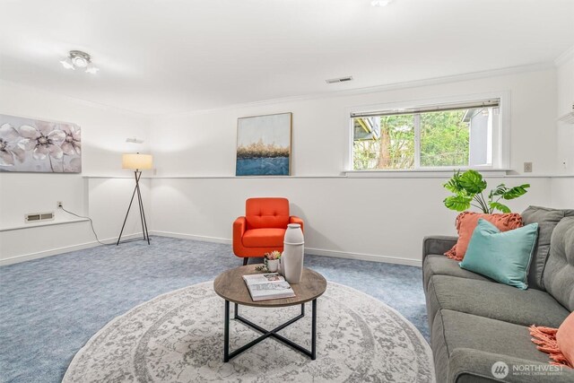 sitting room featuring baseboards, carpet, and visible vents