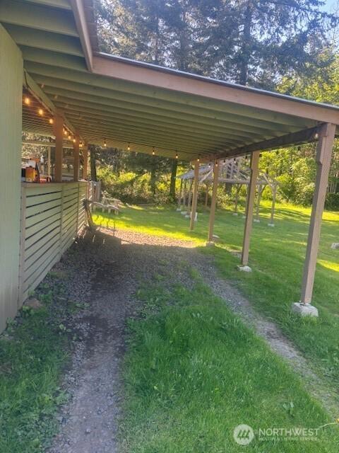 view of car parking featuring a carport