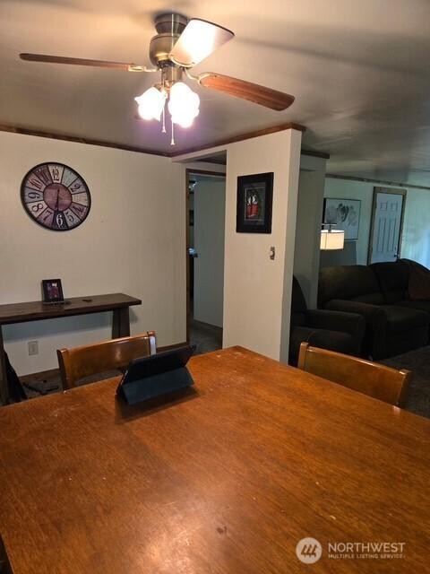 dining area with a ceiling fan