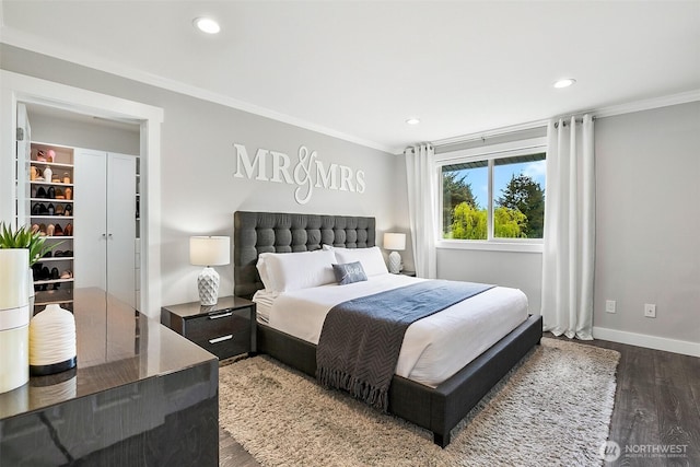 bedroom featuring crown molding, recessed lighting, baseboards, and wood finished floors