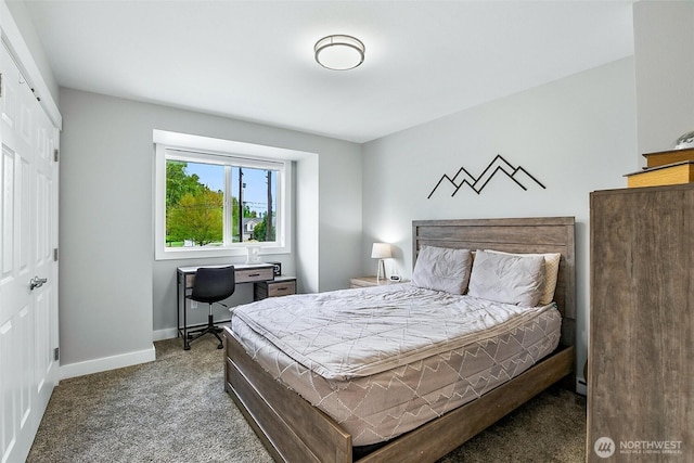 carpeted bedroom with baseboards