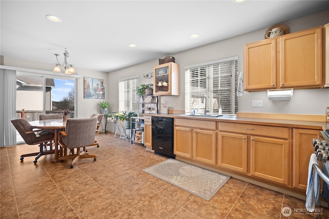 1810 Johnson Ave, Dupont, WA 98327 - kitchen with light brown cabinets, glass insert cabinets, light countertops, a sink, and dishwasher