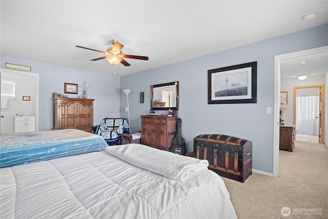 1810 Johnson Ave, Dupont, WA 98327 - bedroom featuring baseboards, ceiling fan, connected bathroom, and light colored carpet