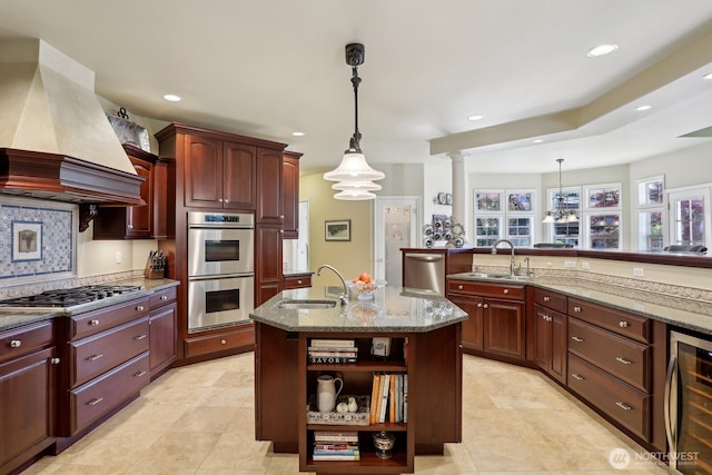 26712 151st St E, Buckley, WA 98321 - kitchen with wine cooler, stainless steel appliances, recessed lighting, and a sink