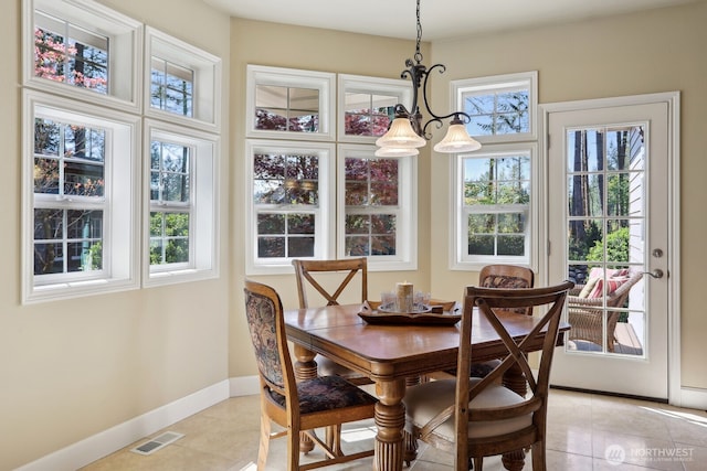 26712 151st St E, Buckley, WA 98321 - dining area with a wealth of natural light, visible vents, baseboards, and light tile patterned flooring