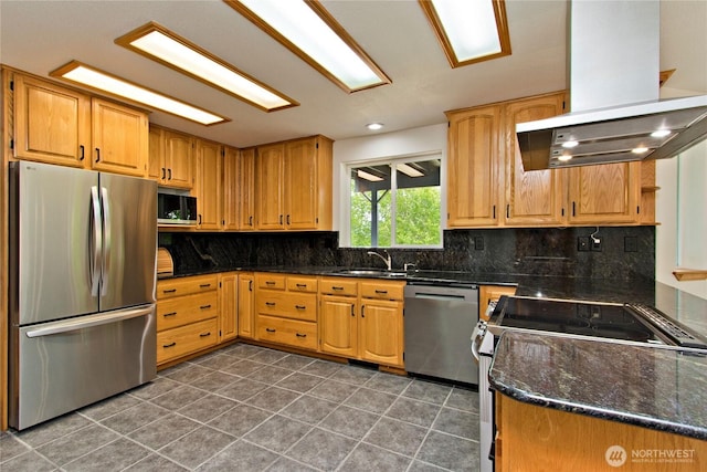 511 104th Ln SE, Olympia, WA 98501 - kitchen with appliances with stainless steel finishes, extractor fan, dark tile patterned floors, decorative backsplash, and a sink