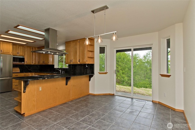 511 104th Ln SE, Olympia, WA 98501 - kitchen with open shelves, appliances with stainless steel finishes, island exhaust hood, dark countertops, and backsplash