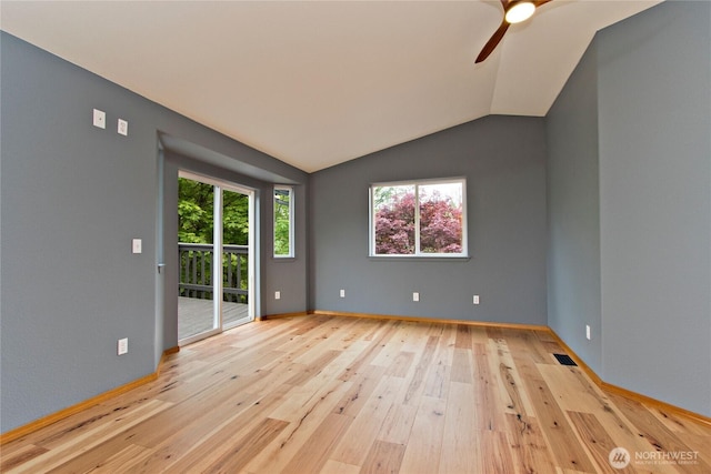 511 104th Ln SE, Olympia, WA 98501 - unfurnished room featuring light wood-style floors, ceiling fan, baseboards, and lofted ceiling