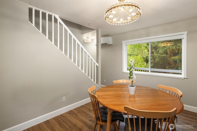 6369 23rd Ave SW, Seattle, WA 98106 - dining area featuring stairs, baseboards, a chandelier, and wood finished floors