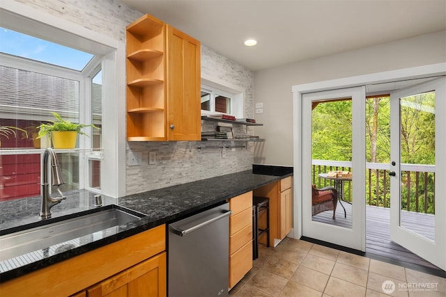 6369 23rd Ave SW, Seattle, WA 98106 - kitchen with open shelves, a sink, dishwasher, light tile patterned floors, and backsplash
