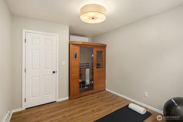 6369 23rd Ave SW, Seattle, WA 98106 - exercise area featuring baseboards, light wood-style flooring, and visible vents