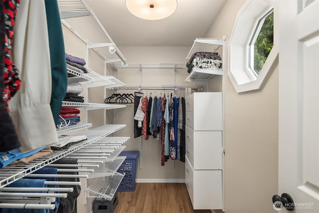 6369 23rd Ave SW, Seattle, WA 98106 - spacious closet featuring wood finished floors