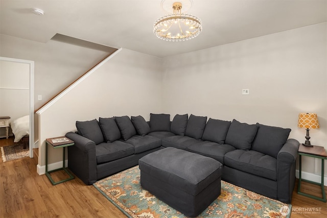 6369 23rd Ave SW, Seattle, WA 98106 - living area with light wood-type flooring, baseboards, and a chandelier