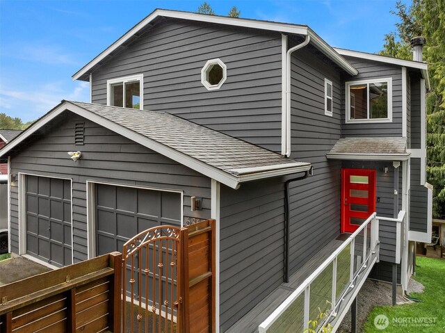 6369 23rd Ave SW, Seattle, WA 98106 - view of front of home featuring roof with shingles