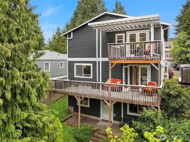 6369 23rd Ave SW, Seattle, WA 98106 - back of house featuring a deck and a balcony