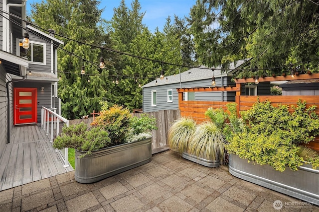 6369 23rd Ave SW, Seattle, WA 98106 - view of patio featuring a deck and fence