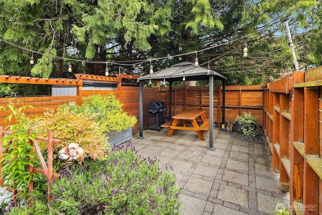 6369 23rd Ave SW, Seattle, WA 98106 - view of patio featuring area for grilling, a gazebo, and a fenced backyard