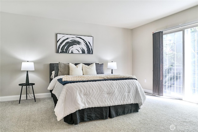 bedroom featuring carpet floors, access to outside, and baseboards