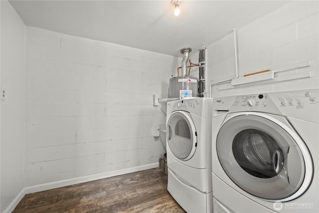 5808 241st St SW, Mountlake Terrace, WA 98036 - laundry room with baseboards, laundry area, wood finished floors, and washing machine and clothes dryer