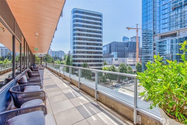 balcony featuring a view of city