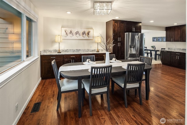 dining space with dark wood-style flooring, baseboards, visible vents, and recessed lighting