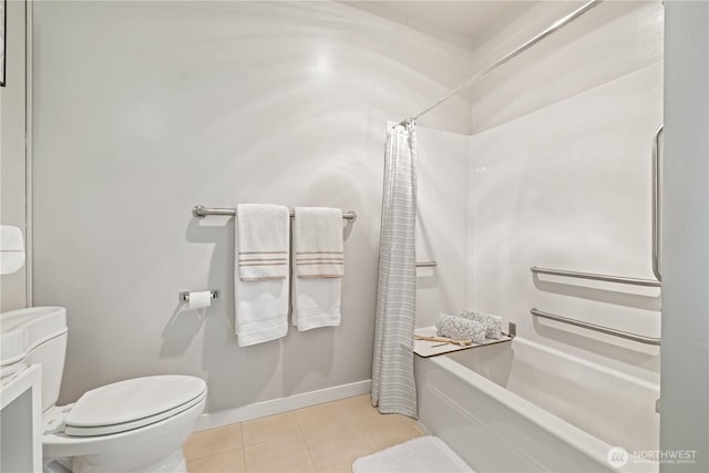 bathroom with tile patterned floors, baseboards, toilet, and shower / tub combo