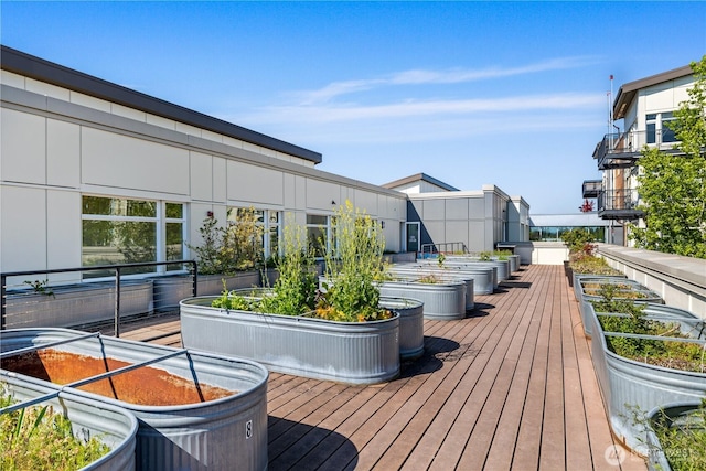 wooden deck featuring a garden