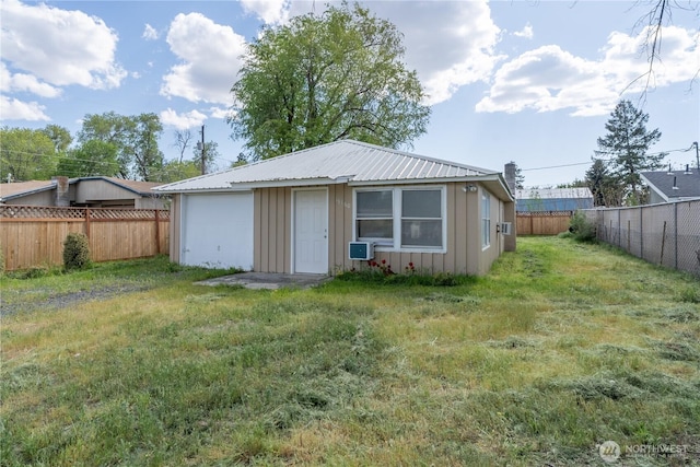 view of outbuilding with a fenced backyard