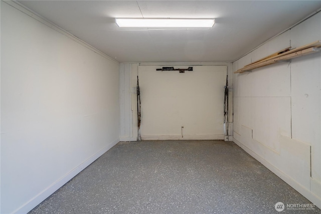 garage with baseboards
