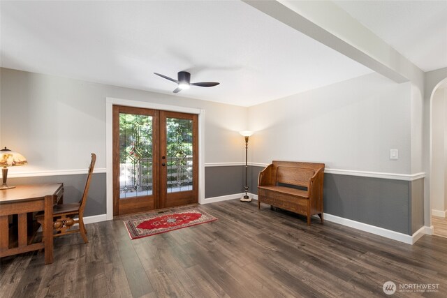 interior space with french doors, baseboards, ceiling fan, and wood finished floors