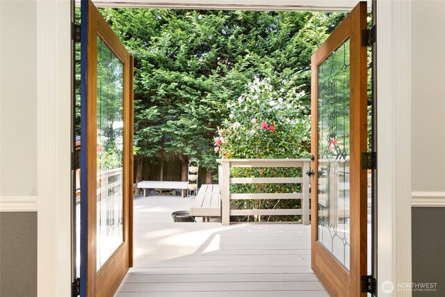 doorway to outside featuring plenty of natural light