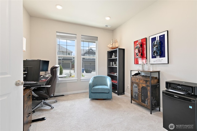 home office featuring carpet flooring, baseboards, and visible vents