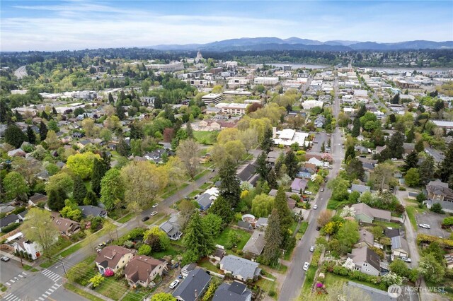 aerial view with a mountain view and a residential view