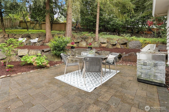 15506 Juanita Dr NE, Kenmore, WA 98028 - view of patio / terrace featuring fence, outdoor dining space, and an outdoor kitchen
