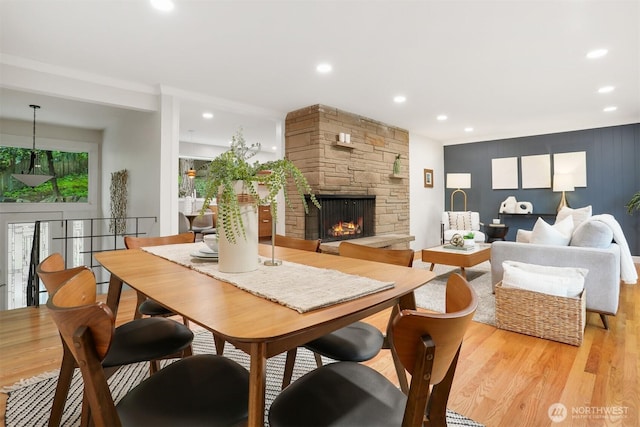 15506 Juanita Dr NE, Kenmore, WA 98028 - dining space with recessed lighting, light wood finished floors, and a fireplace