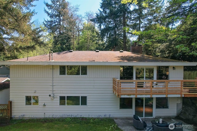 15506 Juanita Dr NE, Kenmore, WA 98028 - rear view of house with roof with shingles, a chimney, and a deck
