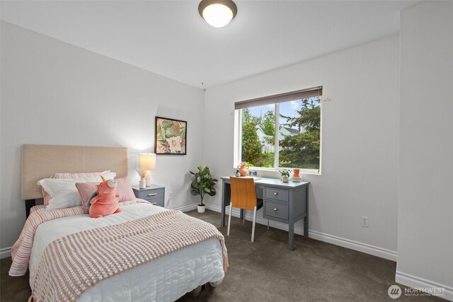 carpeted bedroom with baseboards