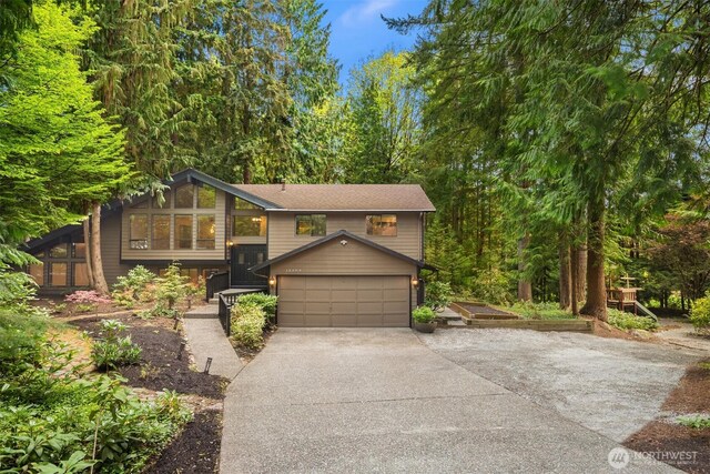 split foyer home featuring driveway