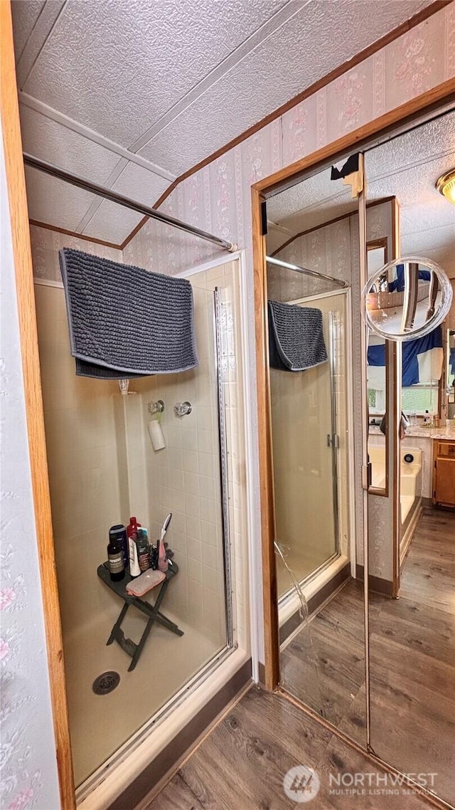 13118 Lost Lake Rd Unit 12, Snohomish, WA 98296 - full bath with wood finished floors, a shower stall, and a textured ceiling