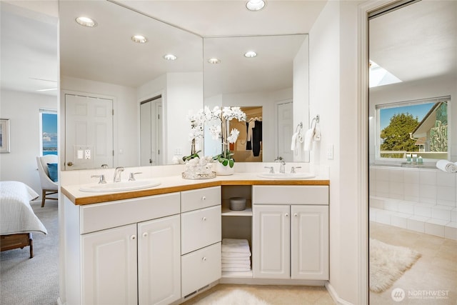 8012 Chinook Way, Blaine, WA 98230 - bathroom with a sink, recessed lighting, double vanity, and connected bathroom
