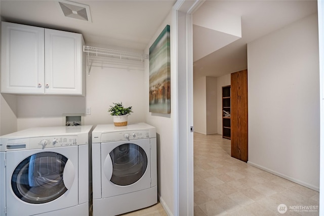 8012 Chinook Way, Blaine, WA 98230 - washroom with washer and dryer, cabinet space, baseboards, light floors, and visible vents